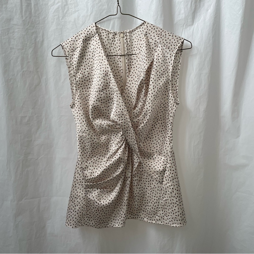 Silk like sleeveless wrap blouse